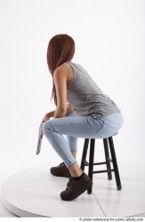 MOLLY SITTING POSE WITH GUN 2